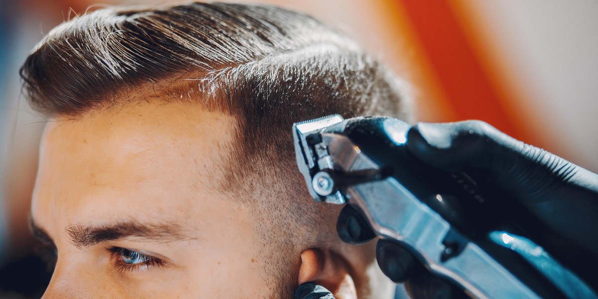 Stylish man sitting in a barbershop