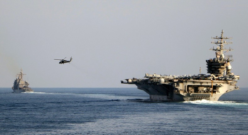 The USS Dwight D. Eisenhower and other warships cross the Strait of Hormuz into the Persian Gulf on Nov. 26, 2023 as part of a wider American deployment in the Middle East amid the Israel-Hamas war.Information Technician Second Class Ruskin Naval/US Navy via AP