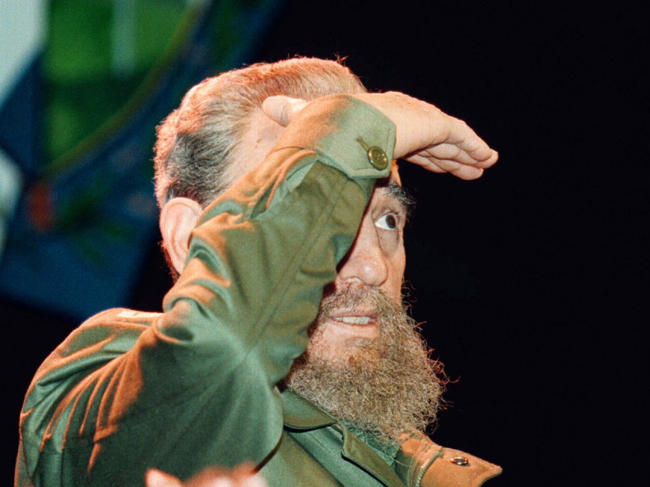 Cuban leader Fidel Castro looks out over a 3,000 stong crowd that screaming "Fidel, Fidel," in a concert hall were left-wing groups were holding a rally against the UN summit for Social Development in Copenhagen.