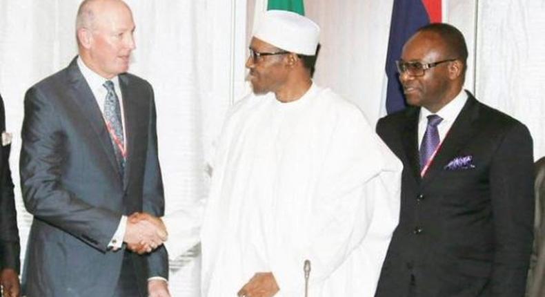 President Muhammadu Buhari meets with newly-appointed Group Managing Director (GMD) of the Nigerian National Petroleum Corporation (NNPC), Ibe Kachikwu and Chairman/Managing Director of Exxonmobil Nigeria, Nolan O’Neal in Abuja on August 4, 2015.