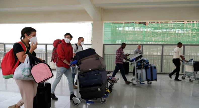 Foreign nationals were flying out of Nigeria's Abuja airport Sunday