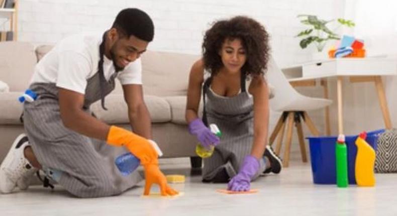 Couple doing house chores together