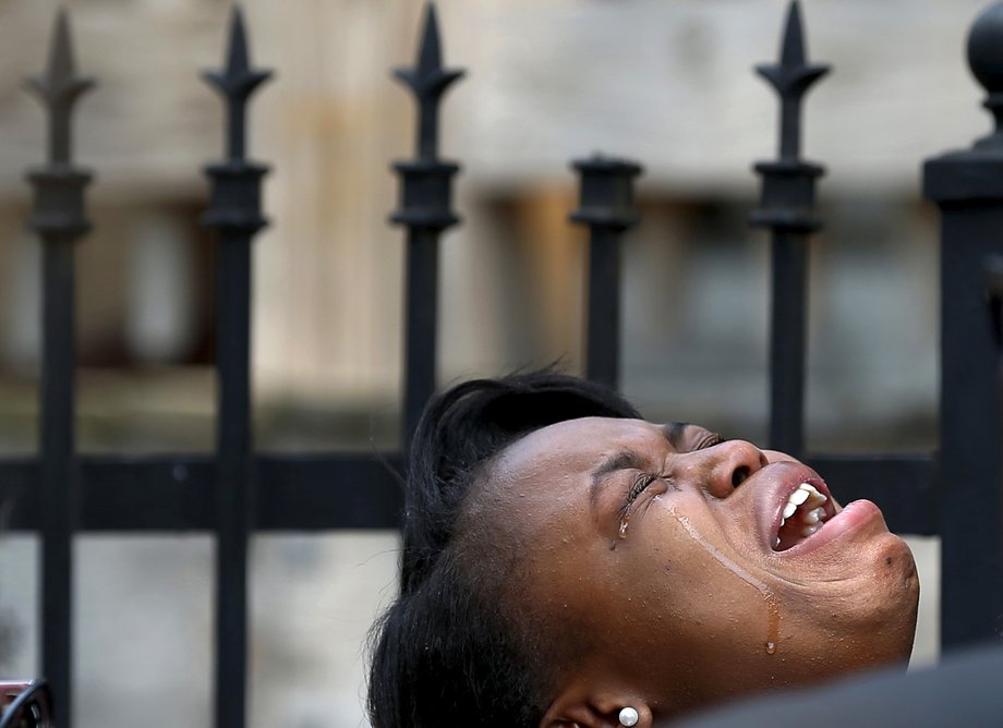 Diamond Trusty cries in grief over the death of her cousin, 7-year-old Amari Brown in Chicago, Illinois, United States, July 5, 2015.