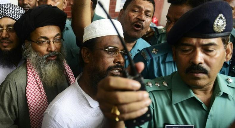 Bangladesh hanged three Islamist extremists including Harkat-ul Jihad al Islami (HUJI) leader Mufti Abdul Hannan (C) on Wednesday, after they were sentenced to death over a 2004 grenade attack on the British ambassador.