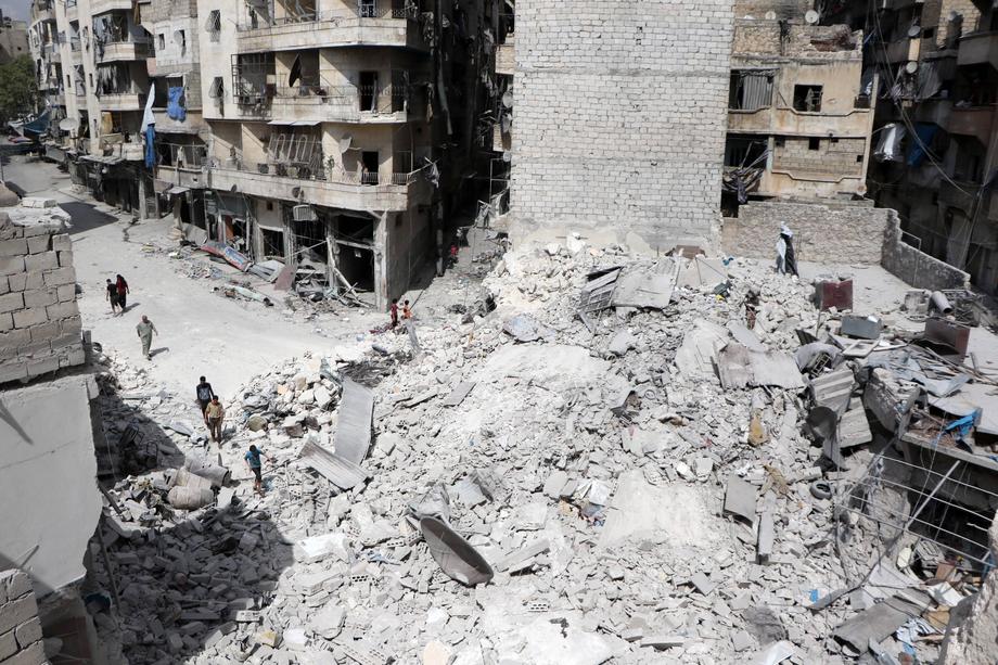 Aleppo, Syria, 22 września. Szczątki budynków po ataku syryjskiej armii w dzielnicę mieszkalną przy użyciu bomb beczkowych.