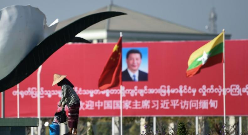 Billboards and banners welcomed China's Xi Jinping to Naypyidaw on Friday