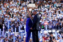 Clinton joins Obama onstage after his remarks on the third night of the Democratic National Conventi