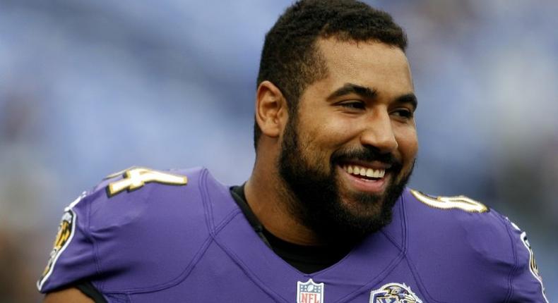 Guard John Urschel of the Baltimore Ravens, pictured in October 2015, who is a doctoral candidate in mathematics at MIT, has retired just two days after a study showed that 99 percent of deceased football players showed degenerative brain disease