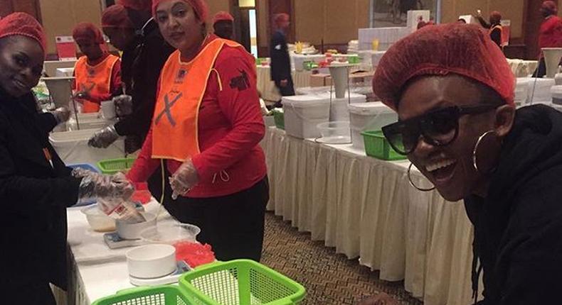 Waje helps give out free meals in South Africa