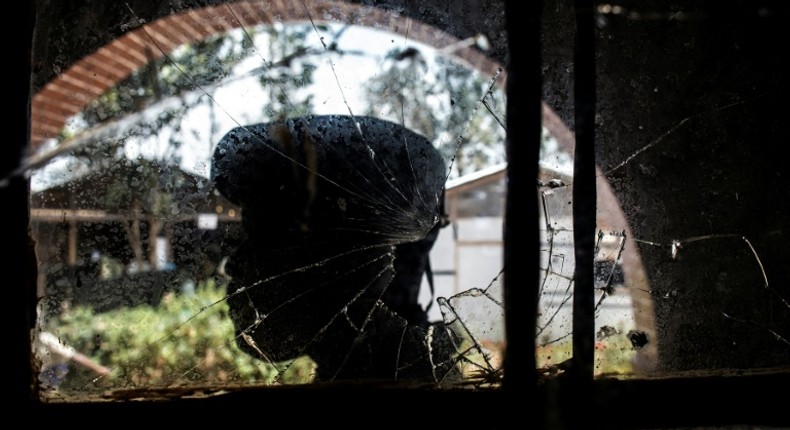 A bullet-shattered window at an Ebola treatment centre in Butembo after it came under attack on March 9. A policeman was killed and a health worker wounded