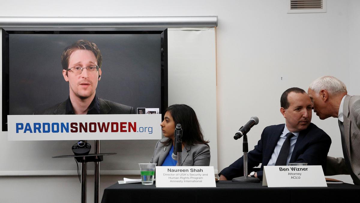 Edward Snowden speaks via video link during a news conference in New York 