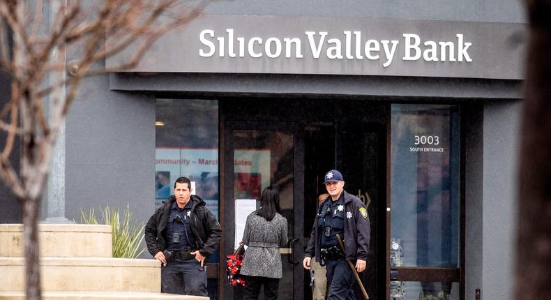 Police officers outside SVB's headquarters in Santa Clara, California on Friday.Getty Images