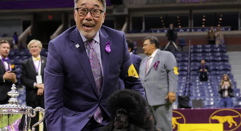 Dog handler Kaz Hosaka and Sage, Best in Show winner pose during the 148th Annual Westminster Kennel Club dog show on May 14, 2024.Michael Loccisano/Getty Images for Westminster Kennel Club