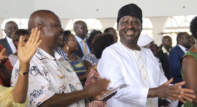 Former Prime Minister Raila Odinga with his brother, EALA MP Oburu Odinga during the 25th commemoration of their father's death (Twitter)