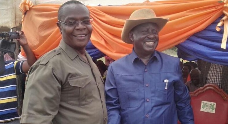 Funyula MP Paul Otuoma with ODM leader Raila Odinga.