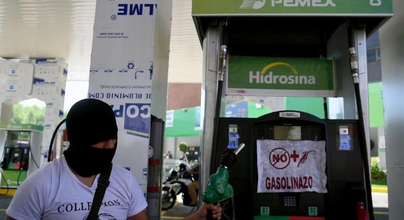 Demonstrators protest the rise in fuel prices in Mexico City