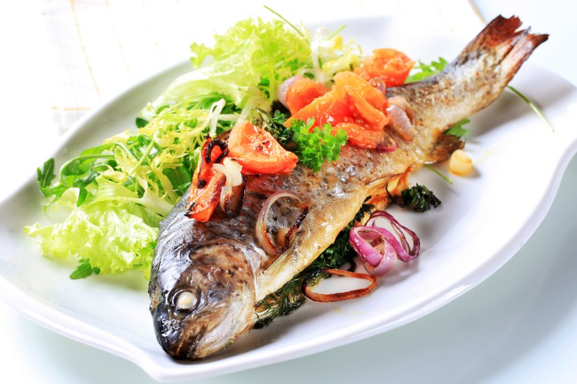 Baked trout with tomatoes and green salad