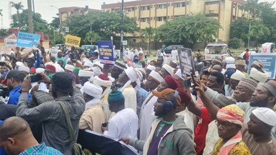 During the protest, participants displayed banners and placards adorned with slogans such as Muslims Reject Official Discrimination, Fairness is All We Seek, and Halt the Screening Now, We Demand Justice [Twitter]