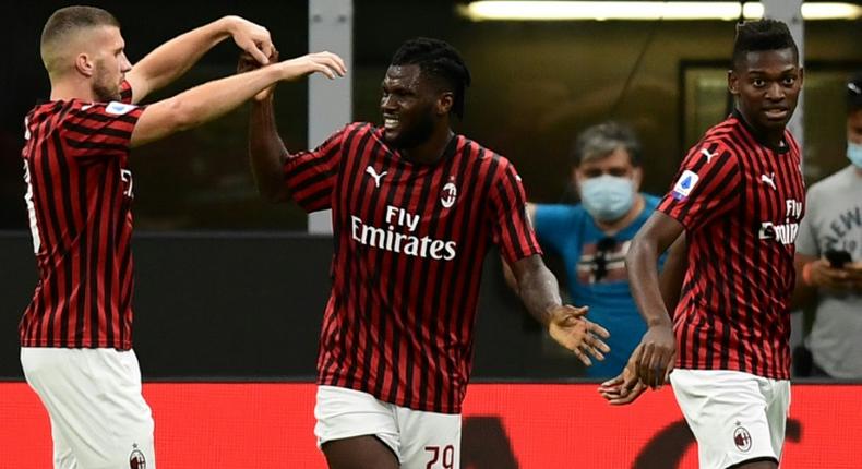 Franck Kessie (C) earned AC Milan a precious point at Napoli