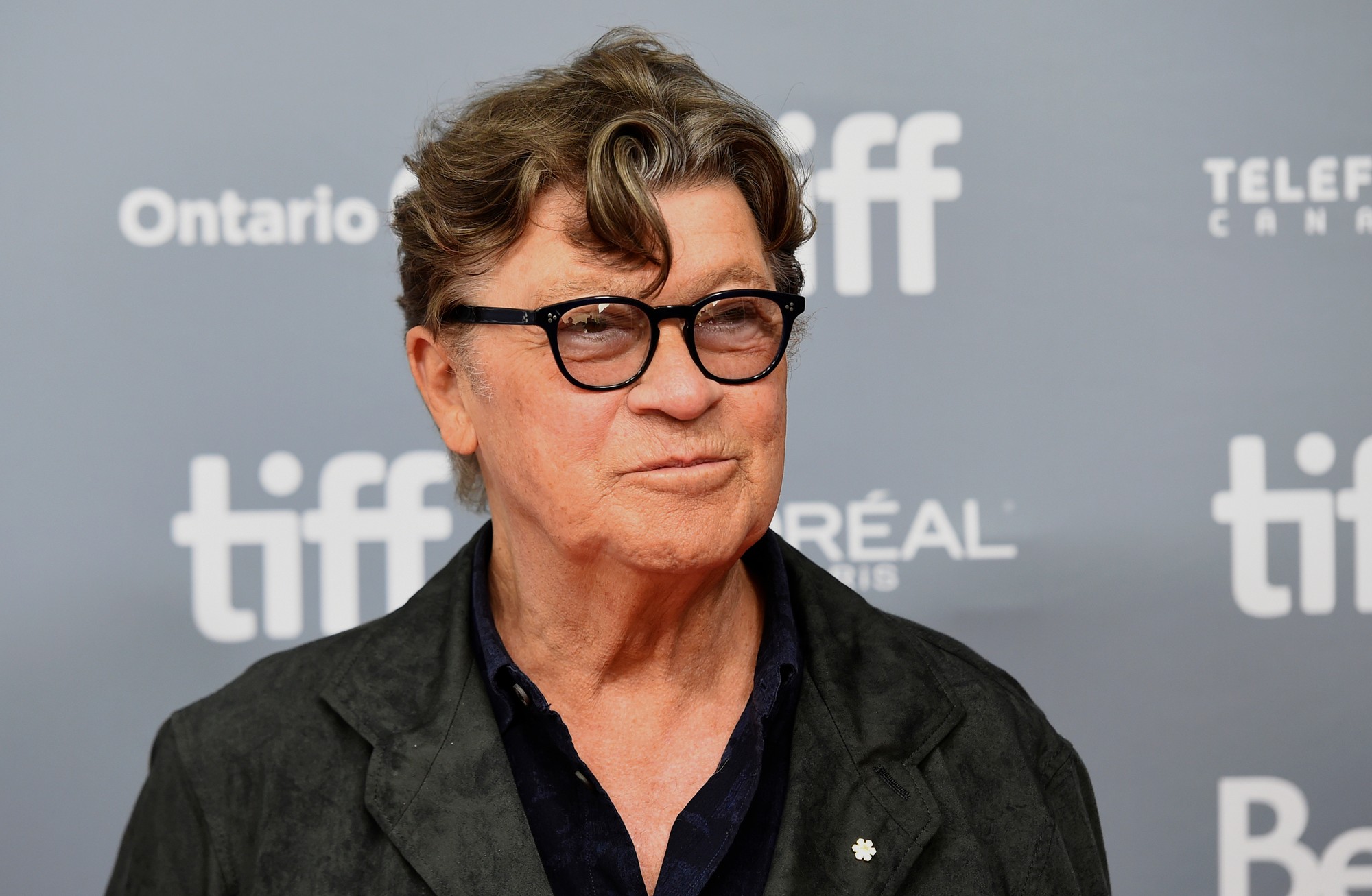 Kanadský gitarista, spevák a skladateľ Robbie Robertson z rockovej skupiny The Band.
