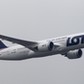 Boeing 787 Dreamliner purchased by Poland's LOT Airlines performs a low altitude flyover at the Chopin International Airport in Warsaw