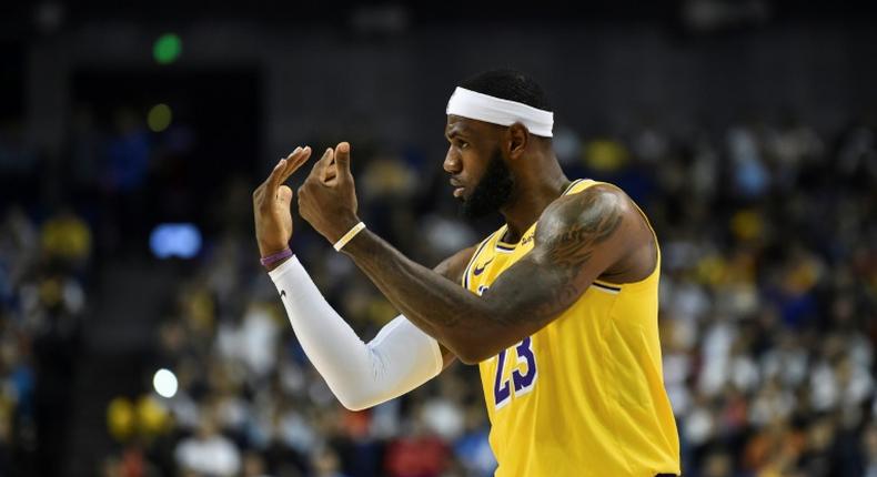 Los Angeles Lakers superstar LeBron James gestures while playing against the Brooklyn Nets on October 10, 2019 at the Mercedes-Benz Arena in Shanghai, China