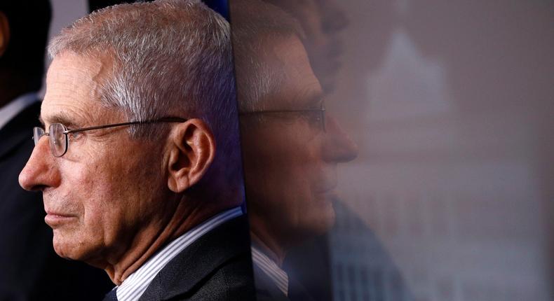 FILE - In this March 21, 2020 file photo, Director of the National Institute of Allergy and Infectious Diseases Dr. Anthony Fauci listens as President Donald Trump speaks during a coronavirus task force briefing at the White House in Washington. (AP Photo/Patrick Semansky)