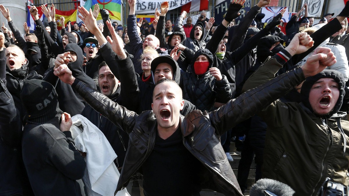 Right-wing demonstrators protest against wave of terrorism in frront of the old stock exchange in Brussels