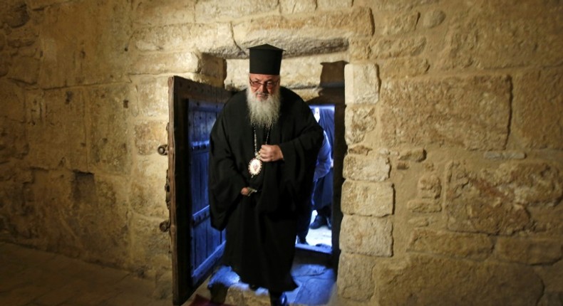 Bishop Theophylactos reopens Bethlehem's Church of the Nativity, built on the spot where Christians believe Jesus was born, as Palestinian authorities ease coronavirus restrictions in the occupied West Bank