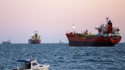 Ships en route to their trading destinations. Photo by BORIS HORVAT/AFP via Getty Images