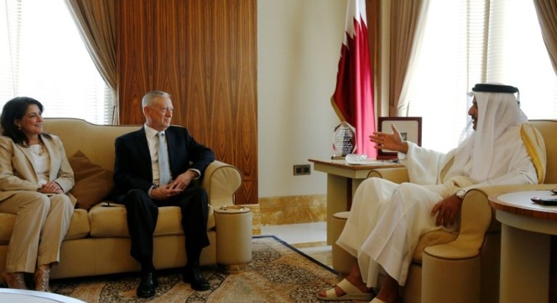 US Ambassador to Qatar Dana Shell Smith (L) tweeeted it was increasingly difficult to wake up to news from home as she need to explain our democracy and institutions