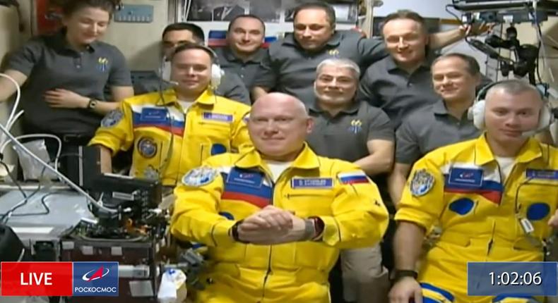 In this frame grab from video provided by Roscosmos, Russian cosmonauts Sergey Korsakov, Oleg Artemyev and Denis Matveyev are seen during a welcome ceremony after arriving at the International Space Station, Friday, March 18, 2022, the first new faces in space since the start of Russia's war in Ukraine.