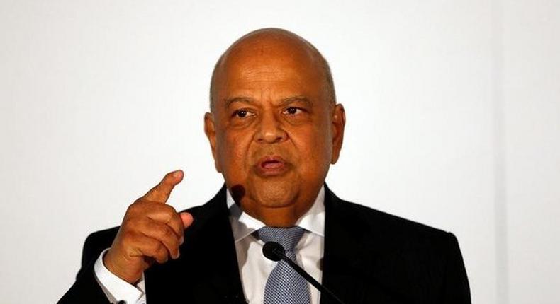 Finance Minister Pravin Gordhan gestures during his address at a business summit in Sandton, South Africa, September 13, 2016