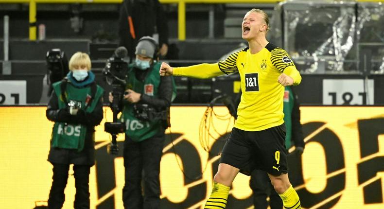 Erling Haaland celebrates scoring his second goal for Dortmund on Friday