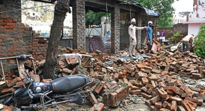 The torrential downpours across the densely populated region cause widespread death and destruction