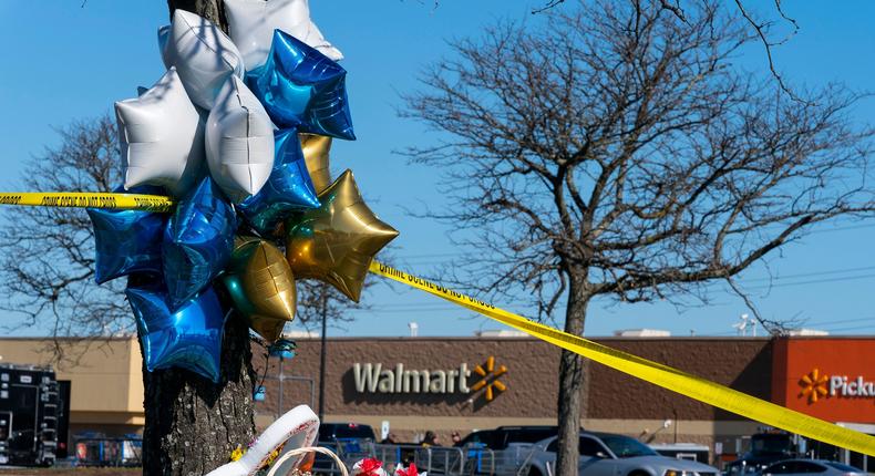 Flowers and balloons placed near the scene of a shooting at a Walmart in Chesapeake, Virginia.Alex Brandon/AP