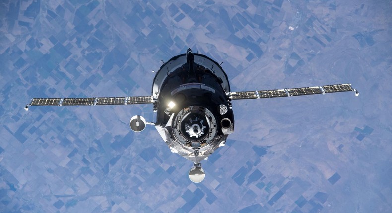 A Soyuz spaceship carrying a Russian film crew and a cosmonaut approaches the International Space Station, October 5, 2021.
