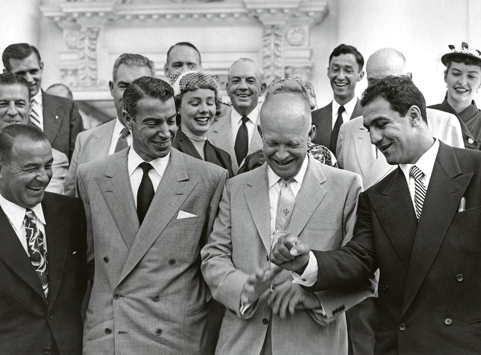 Predsednik SAD Dvajt Ajzenhauer, Džo Dimađio, legendarni bejzbol igrač, i Roki Marćano u junu 1953. godine na humanitarnoj bejzbol utakmici