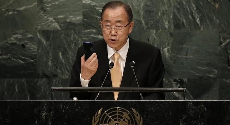 United Nations Secretary General Ban Ki-moon holds up a smart phone as he addresses the General Debate of the 71st Session of the United Nations General Assembly in the Manhattan borough of New York, U.S., September 20, 2016. 