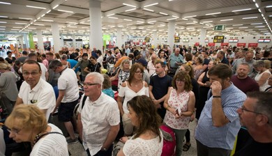 Anxious Thomas Cook passengers seek a way home to Britain