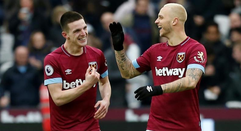 Declan Rice (left) celebrates with West Ham team-mate Marko Arnautovic after scoring the goal that downed Arsenal 1-0 at home