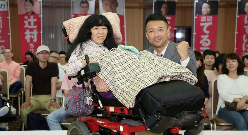 Newly elected lawmaker Eiko Kimura, who is paralysed from the neck down, has called for a system to ensure necessary care for the disabled