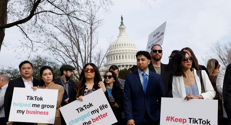 Participants hold signs in support of TikTok outside the US Capitol Building on March 13, 2024, in Washington, DC.Anna Moneymaker/Getty Images