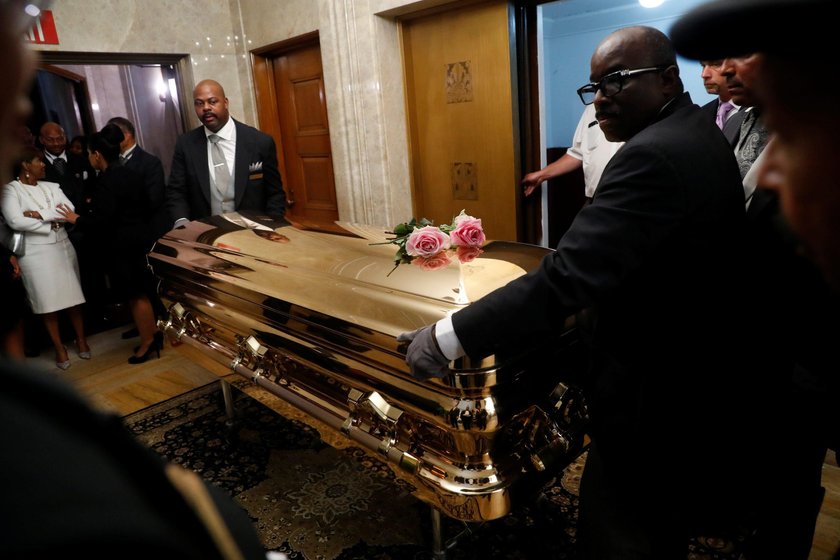 Flowers are seen on the casket of the late singer Aretha Franklin as it is laid to rest at her buria