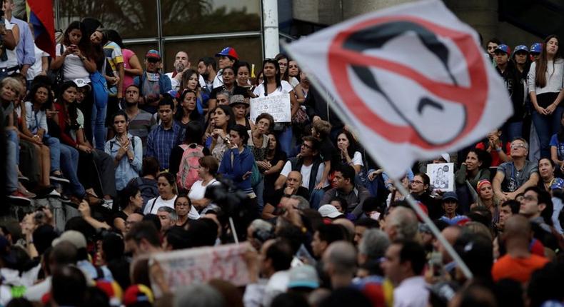 People at a tribute to victims of violence in protests against Venezuelan President Nicolas Maduro's government, in Caracas, July 31, 2017.