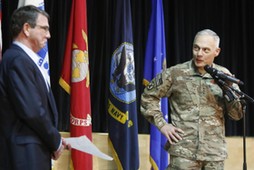 Terry introduces Carter to speak to troops at a question-and-answer session at Camp Arifjan, Kuwait