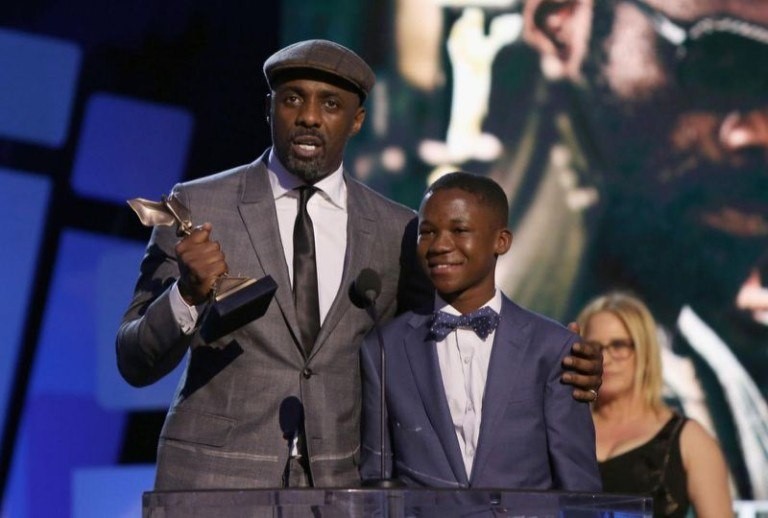 Abraham Attah with Idris Elba 