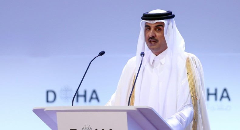 A file picture taken on December 14, 2019 shows the Emir of Qatar Sheikh Tamim bin Hamad al-Thani delivering a speech during the opening session of the Doha Forum in the Qatari capital