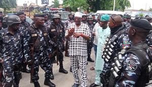 Alhaji Ganiyu Egunjobi the Executive Chairman, Agege LG, addressing the security personnel during the public enlightenment on Friday. [NAN]