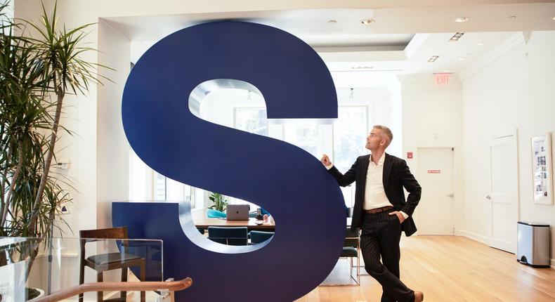 Ryan Serhant poses at the headquarters of his namesake brokerage in Manhattan. Crystal Cox/Insider